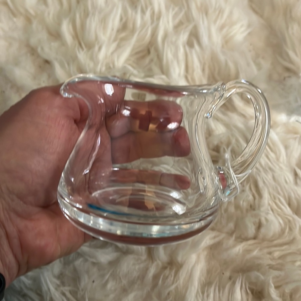 Glass sugar bowl with matching creamer